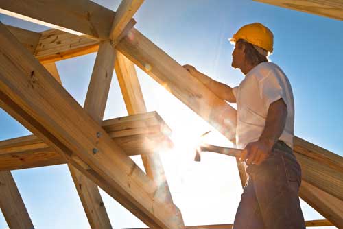 A subcontractor works on a construction project.