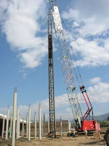 A pile driver contractor works on a project