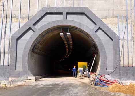 A heavy civil engineer works on construction of a new tunnel